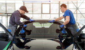 Auto Glass Replacement in a garage, focusing on auto glass repair